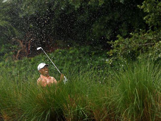 2013-2-28 tiger woods water