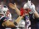 Patriots quarterback Tom Brady (12) celebrates a touchdown