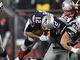 Patriots quarterback Tom Brady (12) runs the ball during