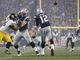 Patriots quarterback Tom Brady (12) throws a pass against