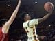 Arizona State guard Shannon Evans II (11) goes up for