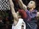 Virginia Tech guard Justin Robinson (5) blocks the