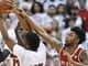 North Carolina State guard Terry Henderson (3) battles