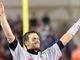 Patriots quarterback Tom Brady (12) celebrates after