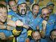 Fernando Alonso, center, celebrates with his Renault