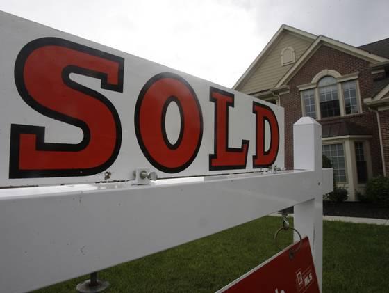 Mortgage rates fall near record lows
