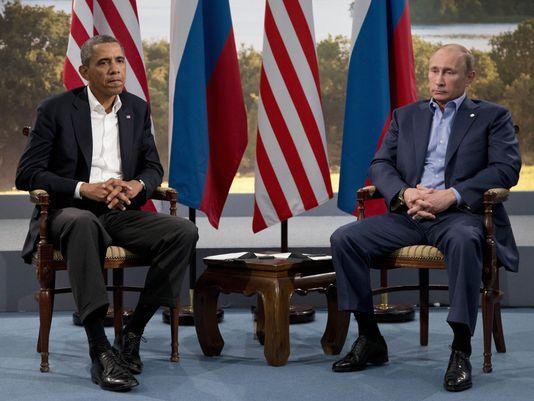 Putin says he can work with Obama
