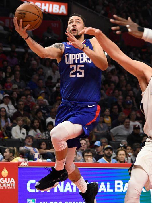 Clippers trading Austin Rivers to Wizards for veteran center Marcin Gortat