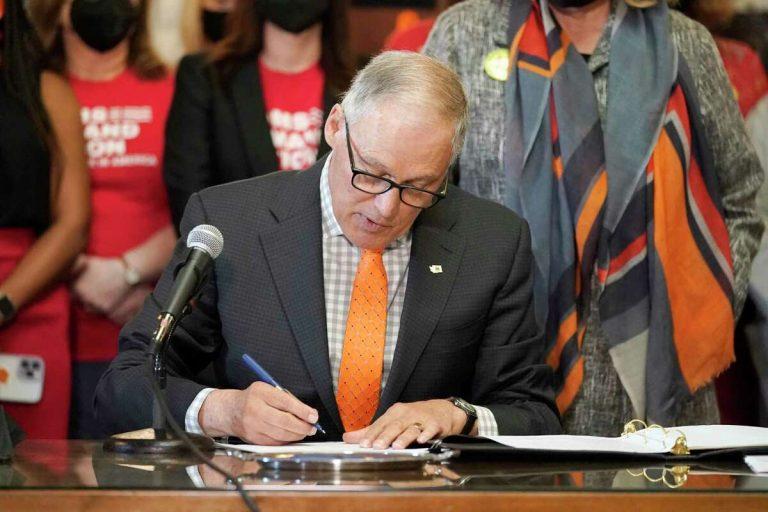 Washington Gov. Jay Inslee signs package of gun restriction bills