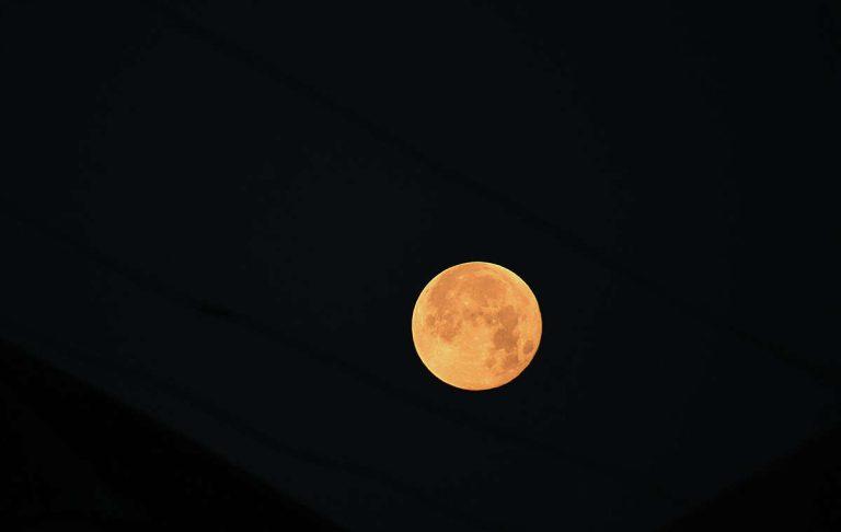Seattle residents will be able to see a 'super flower blood moon' on Sunday if the weather cooperates