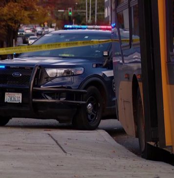 Man shot in chest after altercation on Metro bus spills onto Seattle street; 1 in custody