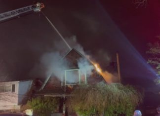 Seattle couple cleaning up after massive fire destroys Leschi home