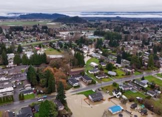 Cleanup continues after record Skagit River flooding with more rain ahead