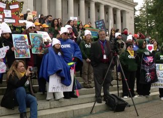 Immigrant advocates rally in Olympia, push funding for WAISN deportation hotline amid rise in ICE activity
