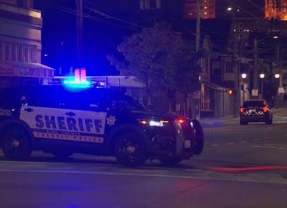 2 men charged with murder in Chinatown-International District shooting after robbery